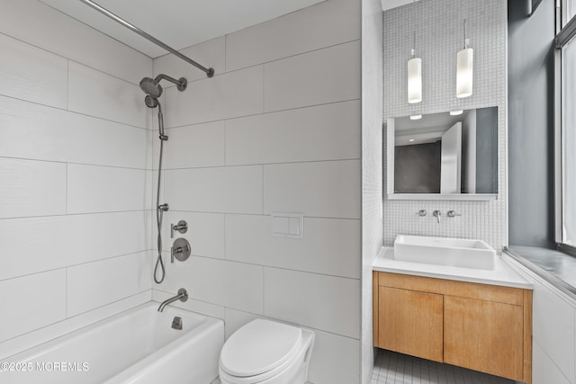 601 Bangs Ave Unit 701, Asbury Park, NJ 07712 - bathroom with bathing tub / shower combination, tile walls, vanity, and toilet