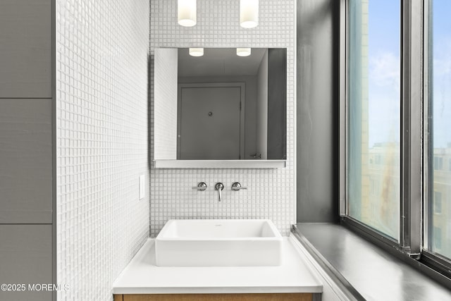 601 Bangs Ave Unit 701, Asbury Park, NJ 07712 - bathroom with tile walls and a sink