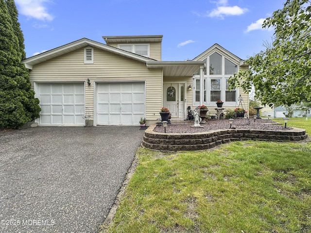 9 Sami Dr, Howell, NJ 07731 - view of front facade featuring driveway, a front lawn, and a garage