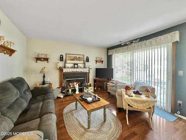 9 Sami Dr, Howell, NJ 07731 - living area featuring a fireplace with flush hearth and wood finished floors