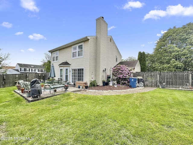 9 Sami Dr, Howell, NJ 07731 - rear view of property featuring a patio area, a fenced backyard, and a chimney