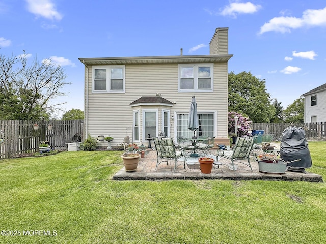 9 Sami Dr, Howell, NJ 07731 - rear view of house featuring a chimney, a fenced backyard, and a patio area