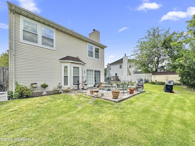 9 Sami Dr, Howell, NJ 07731 - rear view of property with a patio area and a chimney