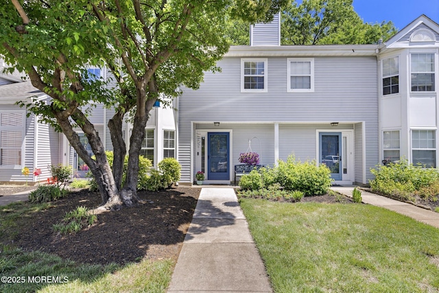 405 Hampton Ct Unit 15-4, Manalapan, NJ 07726 - townhome / multi-family property featuring a chimney and a front yard