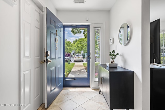405 Hampton Ct Unit 15-4, Manalapan, NJ 07726 - foyer entrance featuring light tile patterned floors