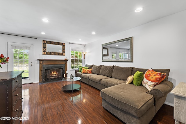 405 Hampton Ct Unit 15-4, Manalapan, NJ 07726 - living area featuring healthy amount of natural light, wood finished floors, recessed lighting, and a fireplace with flush hearth