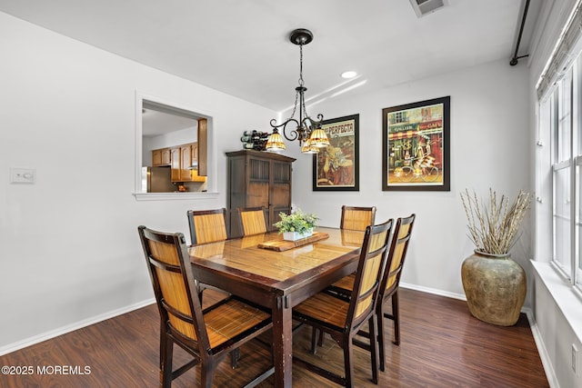 405 Hampton Ct Unit 15-4, Manalapan, NJ 07726 - dining room featuring dark wood-style floors, baseboards, and a chandelier