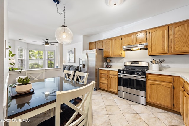 405 Hampton Ct Unit 15-4, Manalapan, NJ 07726 - kitchen featuring appliances with stainless steel finishes, under cabinet range hood, light tile patterned flooring, a ceiling fan, and light countertops