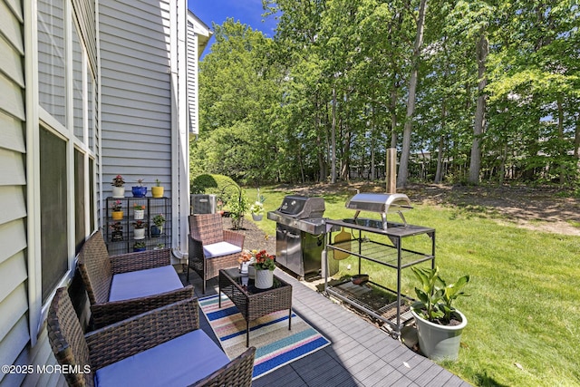 405 Hampton Ct Unit 15-4, Manalapan, NJ 07726 - wooden deck with area for grilling, a lawn, an outdoor living space, and view of wooded area