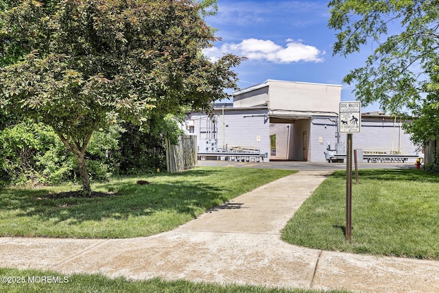 405 Hampton Ct Unit 15-4, Manalapan, NJ 07726 - view of front of house featuring a front yard