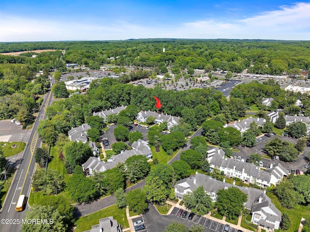 405 Hampton Ct Unit 15-4, Manalapan, NJ 07726 - view of property location featuring a heavily wooded area and nearby suburban area