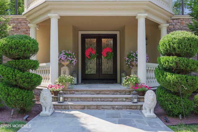 6 Bordens Brook Way, Holmdel, NJ 07733 - entrance to property with covered porch, stucco siding, and stone siding