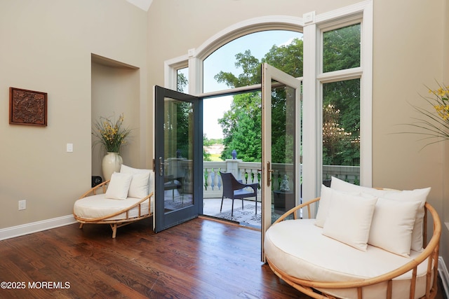 6 Bordens Brook Way, Holmdel, NJ 07733 - sitting room with dark wood-style floors, french doors, and baseboards