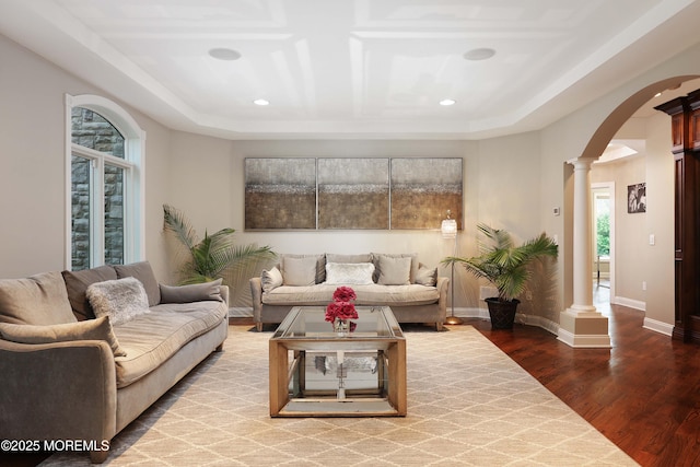 6 Bordens Brook Way, Holmdel, NJ 07733 - living area featuring ornate columns, arched walkways, plenty of natural light, wood finished floors, and recessed lighting