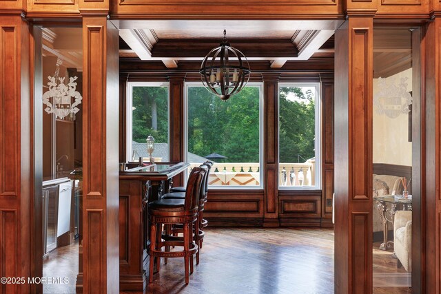 6 Bordens Brook Way, Holmdel, NJ 07733 - dining space featuring a chandelier, ornamental molding, coffered ceiling, wood finished floors, and beamed ceiling