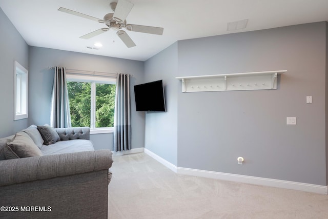 6 Bordens Brook Way, Holmdel, NJ 07733 - living area with light carpet, baseboards, and ceiling fan
