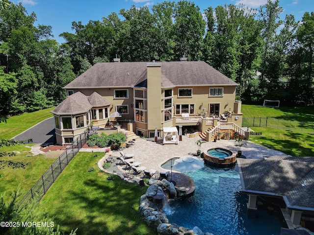 6 Bordens Brook Way, Holmdel, NJ 07733 - rear view of property featuring stairs, a deck, stucco siding, a patio, and a chimney