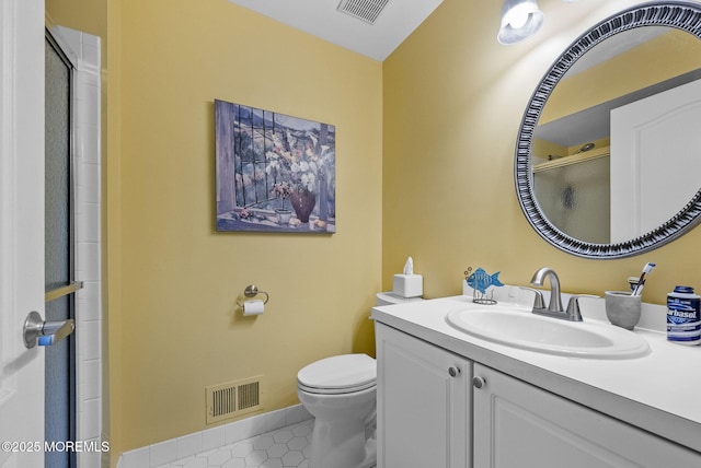 33 Oliver Ct Unit 1, Freehold, NJ 07728 - full bath with toilet, vanity, a shower with door, and tile patterned floors