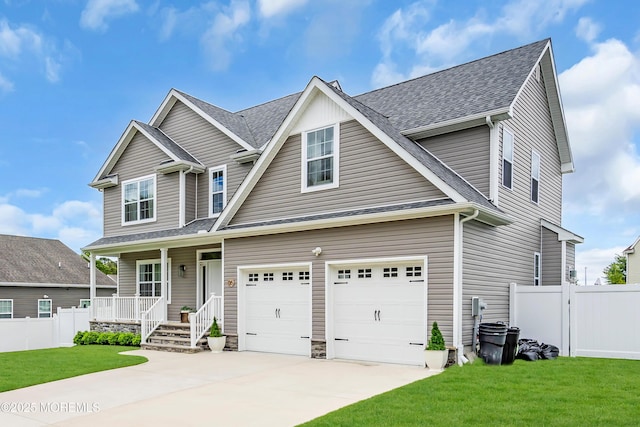6 Harpoon Dr, Barnegat, NJ 08005 - traditional-style home featuring a porch, an attached garage, driveway, and roof with shingles