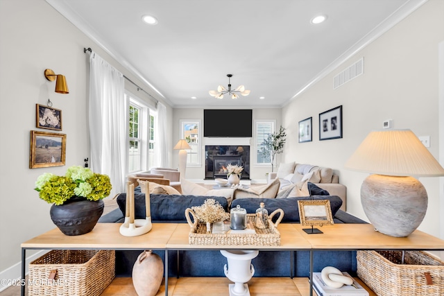 6 Harpoon Dr, Barnegat, NJ 08005 - living area featuring a chandelier, crown molding, recessed lighting, and a glass covered fireplace