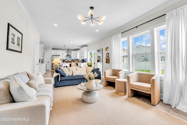6 Harpoon Dr, Barnegat, NJ 08005 - living area featuring crown molding, a chandelier, recessed lighting, and light wood finished floors