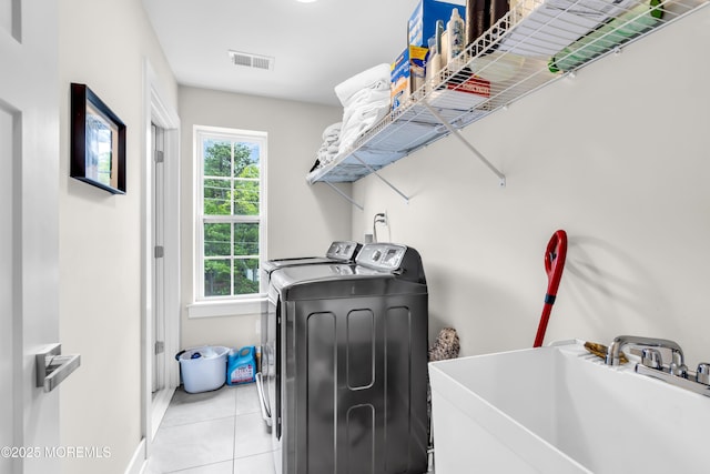 6 Harpoon Dr, Barnegat, NJ 08005 - laundry room featuring independent washer and dryer, light tile patterned floors, and baseboards