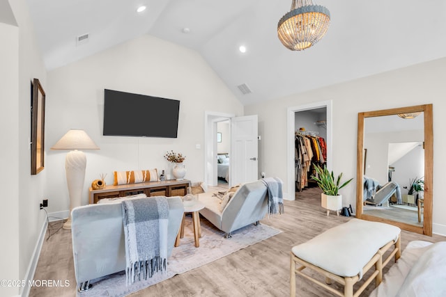 6 Harpoon Dr, Barnegat, NJ 08005 - living area with a chandelier, light wood-style flooring, baseboards, high vaulted ceiling, and recessed lighting