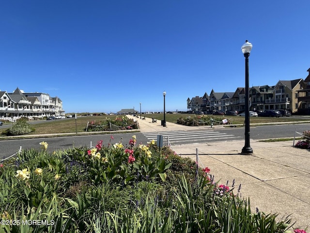 3 5th Ave Unit 208, Neptune City, NJ 07753 - view of street with street lights, sidewalks, curbs, and a residential view