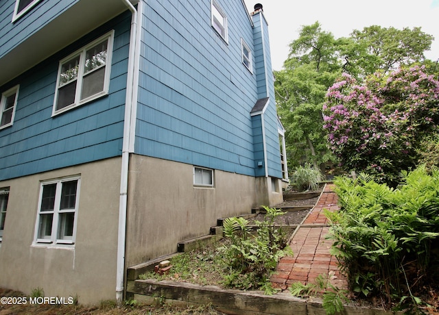 208 Hillcrest Ave, Neptune Township, NJ 07753 - view of property exterior with a chimney