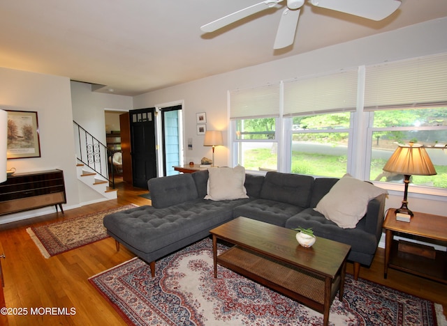 208 Hillcrest Ave, Neptune Township, NJ 07753 - living area featuring healthy amount of natural light, wood finished floors, ceiling fan, and stairway