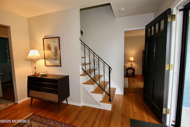 208 Hillcrest Ave, Neptune Township, NJ 07753 - entrance foyer featuring wood finished floors, stairs, and baseboards