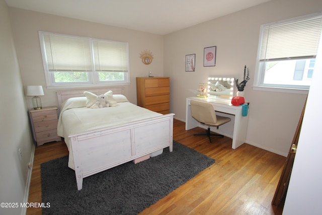 208 Hillcrest Ave, Neptune Township, NJ 07753 - bedroom with light wood finished floors and baseboards