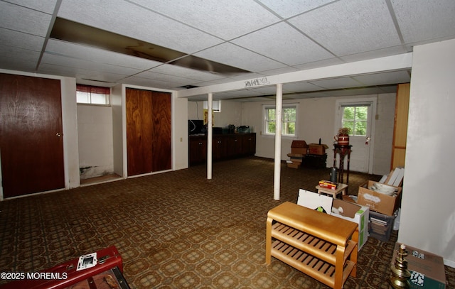 208 Hillcrest Ave, Neptune Township, NJ 07753 - below grade area with a paneled ceiling, healthy amount of natural light, and carpet