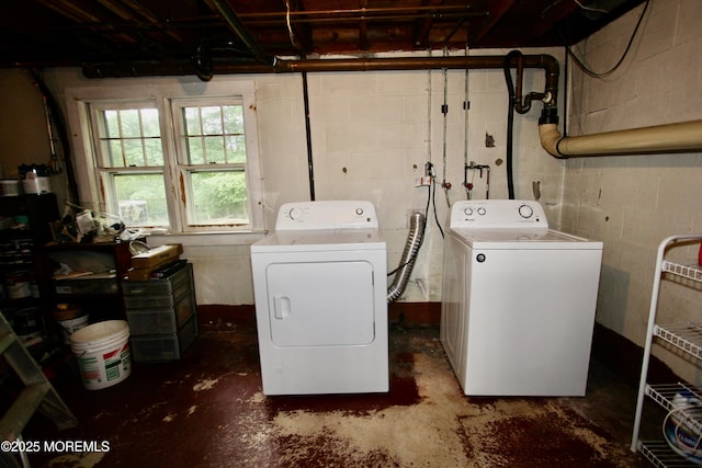 208 Hillcrest Ave, Neptune Township, NJ 07753 - laundry area with washing machine and clothes dryer and concrete block wall