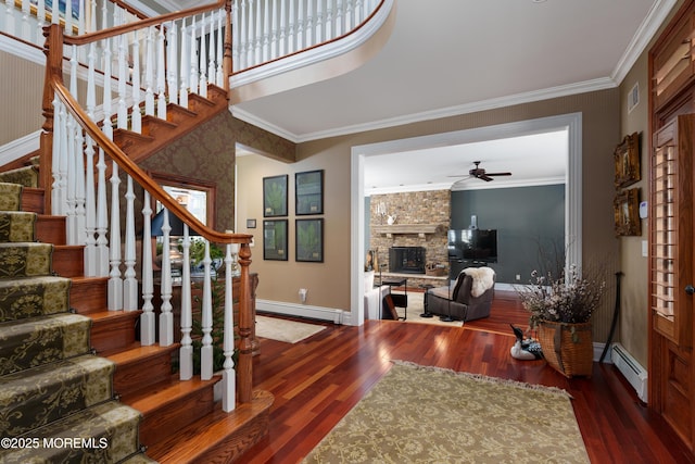 7 Stoney Brook Dr, Millstone, NJ 08510 - stairway featuring a baseboard radiator, wood finished floors, baseboards, crown molding, and ceiling fan