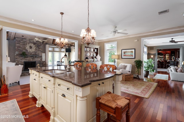 7 Stoney Brook Dr, Millstone, NJ 08510 - kitchen featuring open floor plan, a ceiling fan, a sink, plenty of natural light, and ornamental molding