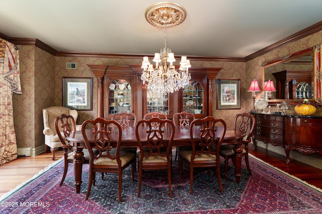7 Stoney Brook Dr, Millstone, NJ 08510 - dining room with wallpapered walls, wood finished floors, a chandelier, and crown molding