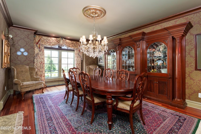 7 Stoney Brook Dr, Millstone, NJ 08510 - dining room featuring wallpapered walls, a chandelier, wood finished floors, crown molding, and a baseboard heating unit
