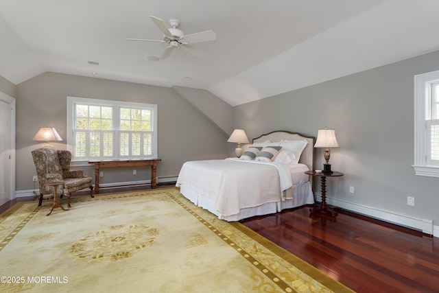7 Stoney Brook Dr, Millstone, NJ 08510 - bedroom with a baseboard radiator, vaulted ceiling, wood finished floors, multiple windows, and baseboards