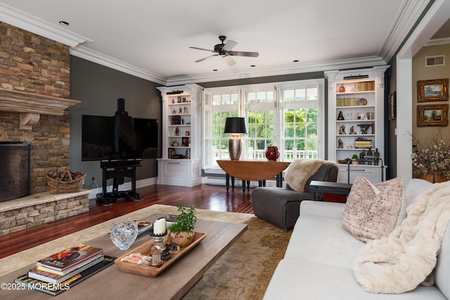 7 Stoney Brook Dr, Millstone, NJ 08510 - living area featuring ceiling fan, wood finished floors, crown molding, and a stone fireplace