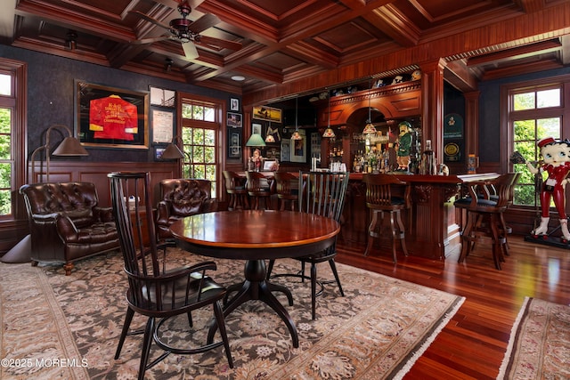7 Stoney Brook Dr, Millstone, NJ 08510 - dining space with ornamental molding, coffered ceiling, a dry bar, beam ceiling, and ceiling fan