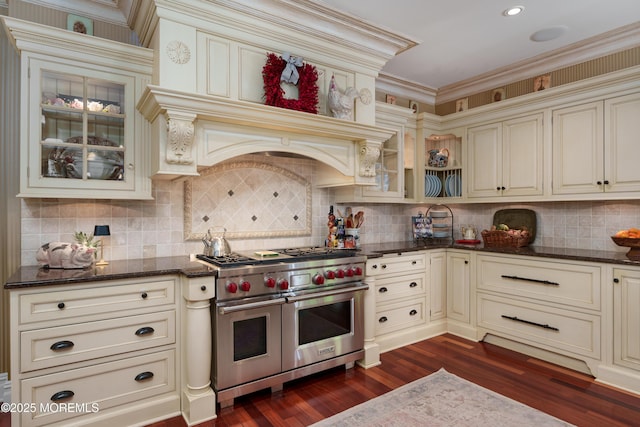 7 Stoney Brook Dr, Millstone, NJ 08510 - kitchen featuring cream cabinets, range with two ovens, dark stone counters, dark wood finished floors, and tasteful backsplash