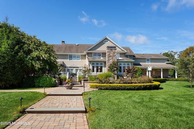 7 Stoney Brook Dr, Millstone, NJ 08510 - view of front facade with a front lawn