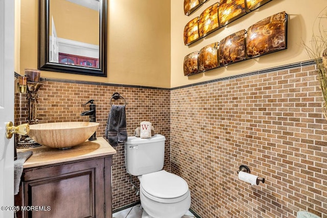 9 Kindling Way, Jackson, NJ 08527 - half bathroom featuring toilet, vanity, a wainscoted wall, and tile patterned floors