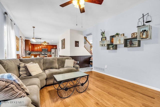 9 Kindling Way, Jackson, NJ 08527 - living room featuring a ceiling fan, light wood-style floors, stairway, and baseboards