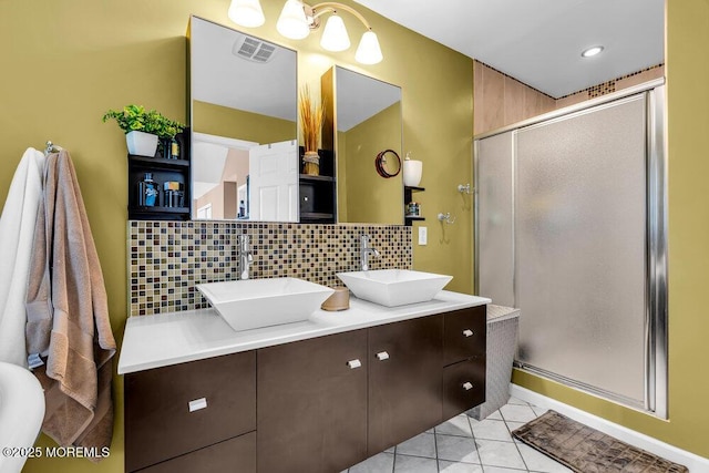 9 Kindling Way, Jackson, NJ 08527 - bathroom with tasteful backsplash, a shower stall, double vanity, and tile patterned floors
