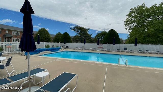 310 Maryland Ave Unit 11B, Point Pleasant Beach, NJ 08742 - community pool featuring a patio
