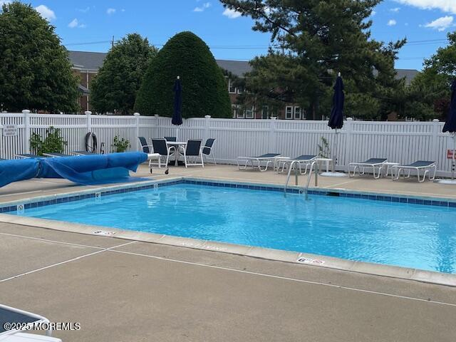 310 Maryland Ave Unit 11B, Point Pleasant Beach, NJ 08742 - community pool featuring a patio area