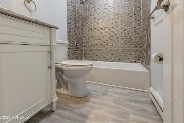 442 Bay Way, Lanoka Harbor, NJ 08734 - full bath with toilet, wood finished floors, tub / shower combination, and a baseboard heating unit