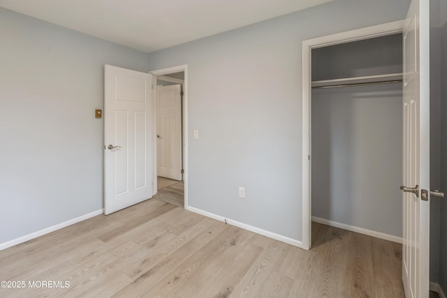 442 Bay Way, Lanoka Harbor, NJ 08734 - unfurnished bedroom with wood finished floors, a closet, and baseboards